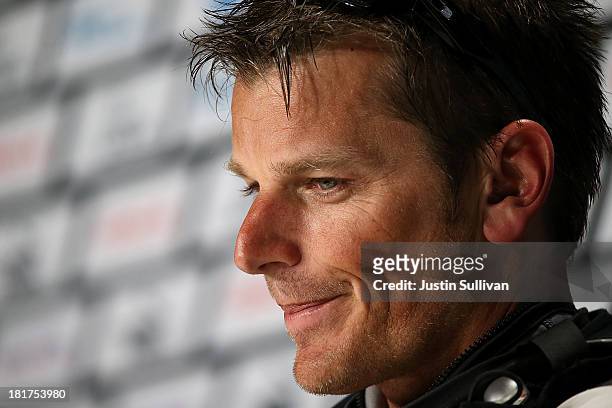 Emirates Team New Zealand skipper Dean Barker looks on during a news conference following races 17 and 18 of the America's Cup finals against Oracle...