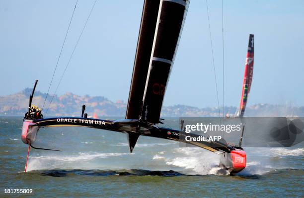 Oracle Team USA comes in to win race 18 of the 34th America's Cup on September 24, 2013 in San Francisco. Oracle Team USA sailed to an unprecedented...