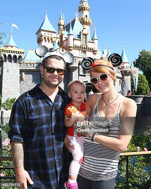 In this handout photo provided by Disney Parks, "Dancing With the Stars" competitor Jack Osbourne, his wife Lisa Stelly and their daughter, Pearl,...