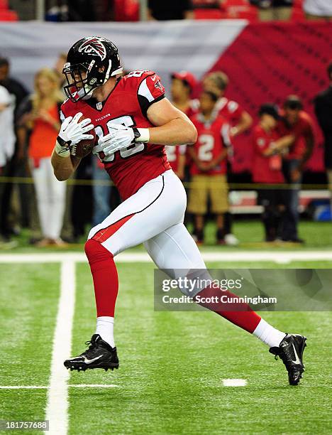 Chase Coffman of the Atlanta Falcons warms up before the game against the St. Louis Rams at the Georgia Dome on September 15, 2013 in Atlanta,...