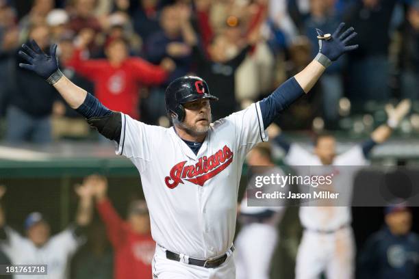 Jason Giambi of the Cleveland Indians celebrates after hiting a walk-off two-run home run to defeat the Chicago White Sox at Progressive Field on...