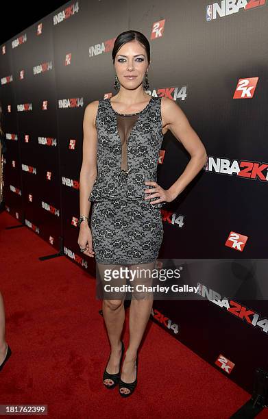 Actress/producer Adrianne Curry attends the NBA 2K14 premiere party at Greystone Manor on September 24, 2013 in West Hollywood, California.