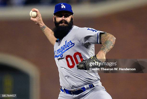 Brian Wilson of the Los Angeles Dodgers pitches in the eighth inning against the San Francisco Giants at AT&T Park on September 24, 2013 in San...