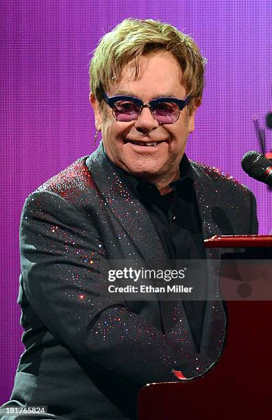 Recording artist Sir Elton John performs during the iHeartRadio Music Festival at the MGM Grand Garden Arena on September 20, 2013 in Las Vegas,...