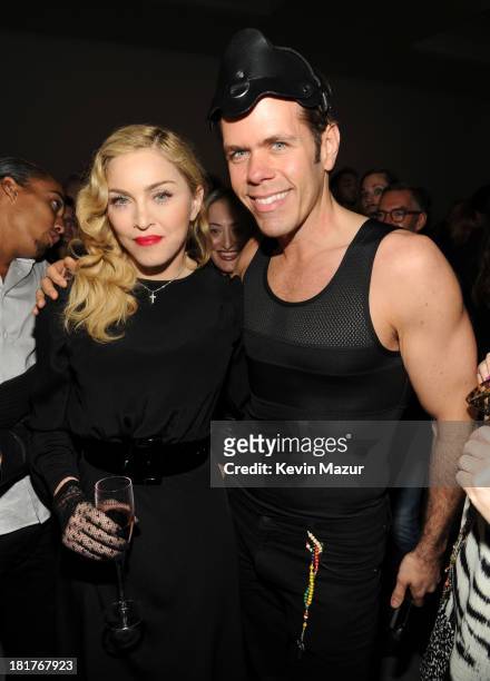 Madonna and Perez Hilton attend Madonna and Steven Klein secretprojectrevolution at the Gagosian Gallery on September 24, 2013 in New York City.
