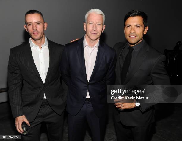 Benjamin Maisani, Anderson Cooper and Mark Consuelos attend Madonna and Steven Klein secretprojectrevolution at the Gagosian Gallery on September 24,...