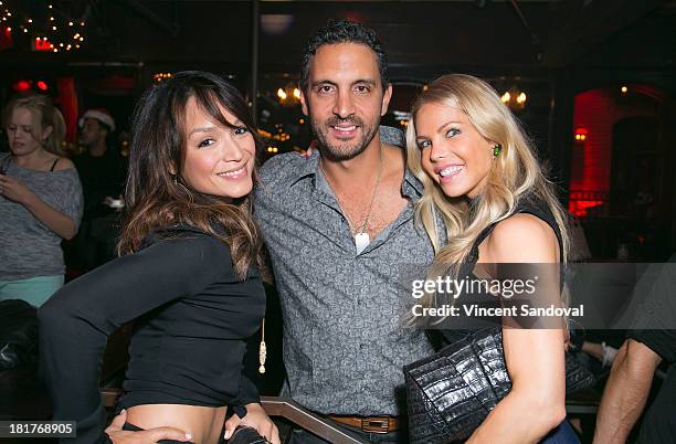 Dancer Mayte Garcia, Mauricio Umansky and author Jessica Canseco attend The Abbey's 8th annual Christmas in September event benefiting The Children's...
