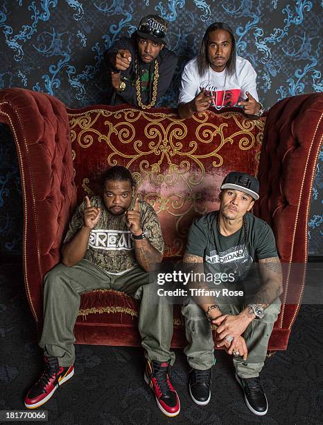 Krayzie Bone, Wish Bone, Flesh-n-Bone and Bizzie Bone of Bone Thugs-n-Harmony pose for 'Skee Live' at L.A. Live on September 24, 2013 in Los Angeles,...