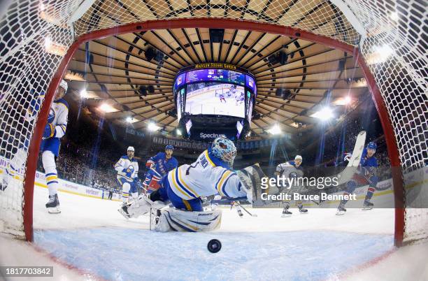 Ukko-Pekka Luukkonen of the Buffalo Sabres makes the third period save on Jimmy Vesey of the New York Rangers at Madison Square Garden on November...