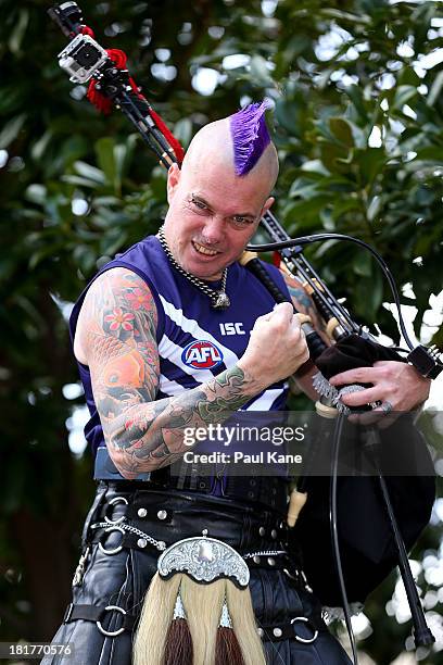 The Bad Piper, Cam McAzie poses after performing in the streets of Perth on September 25, 2013 in Perth, Australia. The Fremantle Dockers play the...