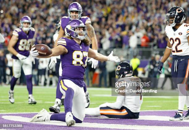 Hockenson of the Minnesota Vikings celebrates after a touchdown during the fourth quarter against the Chicago Bears at U.S. Bank Stadium on November...