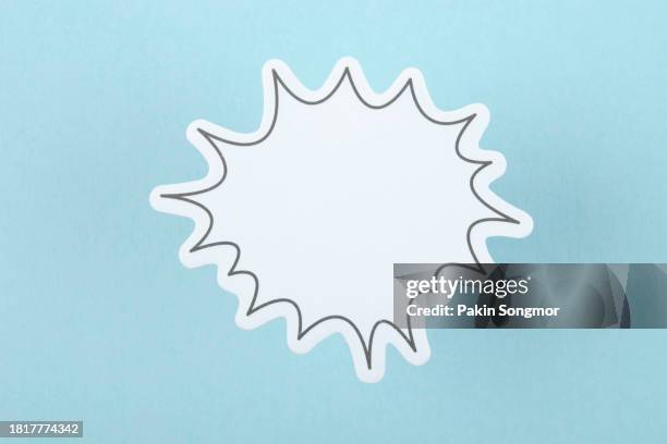 the words talking and speaking are conveyed by a speech bubble with copy space on a blue background. - paper craft stock pictures, royalty-free photos & images