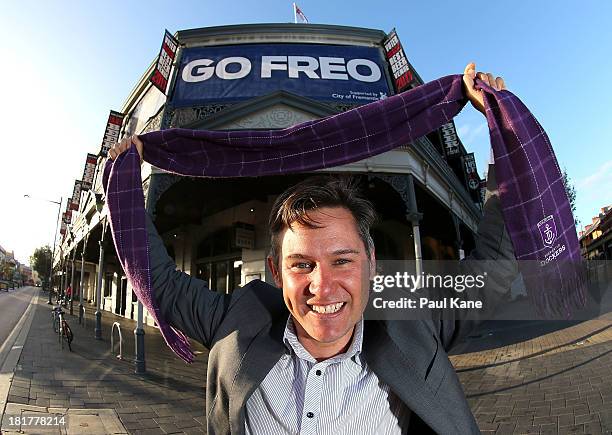 Fremantle Mayor Brad Pettitt shows his support for the Dockers in front of the Sail and Anchor hotel on September 25, 2013 in Fremantle, Australia....