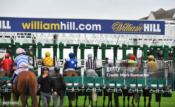 Competitors in The Jordan Electrics Ltd Handicap Stakes preparing to start the race in front of the main stand at Ayr racecourse on September 21,...