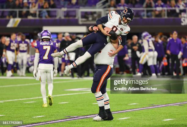 Cairo Santos of the Chicago Bears celebrates with teammates after kicking the game-winning field goal to defeat the Minnesota Vikings at U.S. Bank...