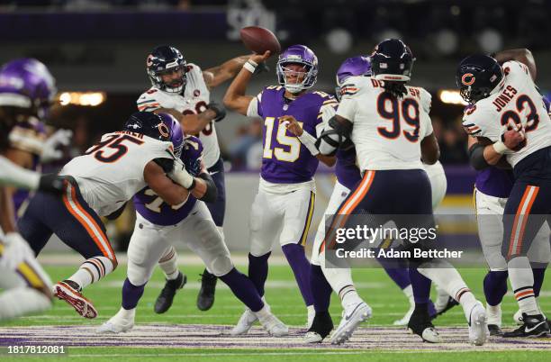 Joshua Dobbs of the Minnesota Vikings looks to pass during the third quarter against the Chicago Bears at U.S. Bank Stadium on November 27, 2023 in...