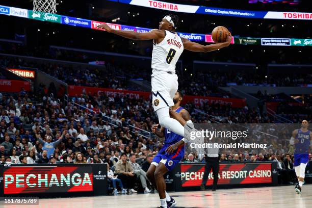Peyton Watson of the Denver Nuggets takes a shot against the LA Clippers in the second half at Crypto.com Arena on November 27, 2023 in Los Angeles,...