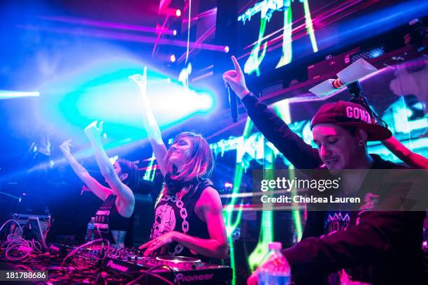 Yasmine Yousaf, Jahan Yousaf and producer Kris "Rain Man" Trindl of Krewella perform at Krewella's "Get Wet" album release foam party at Exchange LA...