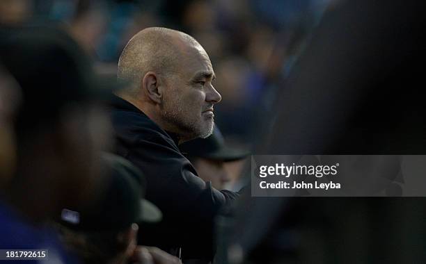 Colorado Rockies hitting coach Dante Bichette watches from the dugout Boston Red Sox September 24, 2013 at Coors Field. Bichette announced he will...