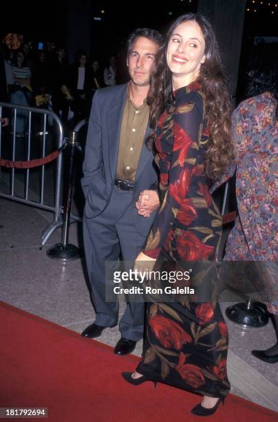 Actor Brian Benben and actress Madeleine Stowe attends the "Seven Years in Tibet" Century City Premiere on October 6, 1997 at the Cineplex Odeon...