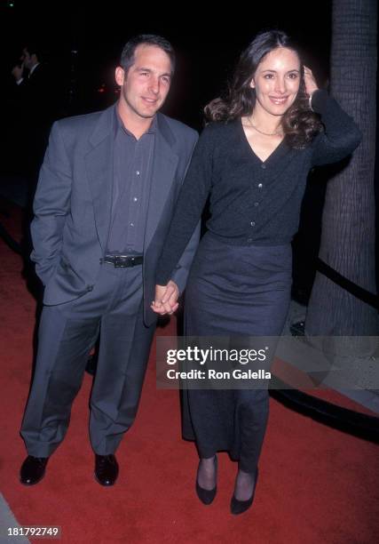 Actor Brian Benben and actress Madeleine Stowe attend the "Amistad" Beverly Hills Premiere on December 8, 1997 at the Samuel Goldwyn Theatre in...