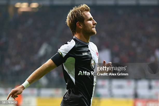 Stefan Aigner of Frankfurt celebrates his team's second goal during the DFB Cup second round match between Eintracht Frankfurt and VfL Bochum at...