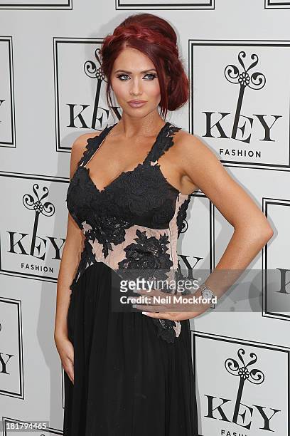 Amy Childs attends a photocall to launch the KEY Fashion brand at Vanilla on September 25, 2013 in London, England.