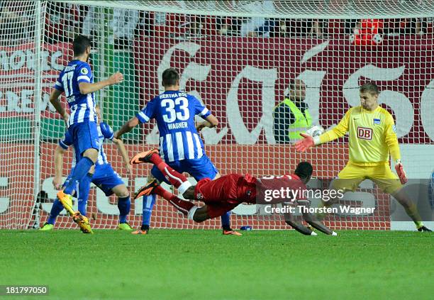 Mohamadou Idrissou is scoring his teams first goal during the DFB Cup 2nd round match between 1.FC Kaiserslautern and Hertha BSC Berlin at...