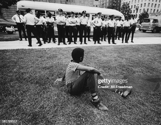 Police line the route of the Poor People's Campaign, an organised demonstration hoping to gain economic justice for poor people in the United States,...