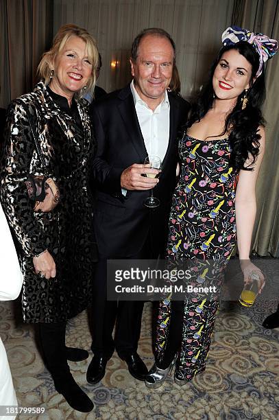 Louise Fennell, William Boyd and Coco Fennell attend the launch of "Solo", the new James Bond novel written by William Boyd, at The Dorchester on...