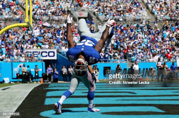 David Wilson of the New York Giants flips after a touchown that was called back during their game against the Carolina Panthers at Bank of America...