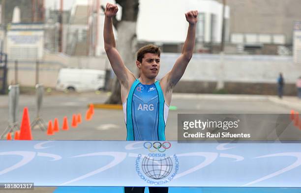 Nicolas Girard of Argentina completes the Running stage during the Triatlon Mixed Team Event as part of the I ODESUR South American Youth Games at...