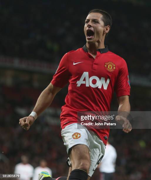 Javier "Chicharito" Hernandez of Manchester United celebrates scoring their first goal during the Capital Cup Third Round match between Manchester...