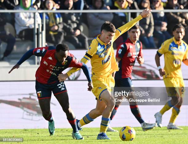 Ridgeciano Haps of Genoa CFC and Matias Soulè of Frosinone Calcio in action during the Serie A TIM match between Frosinone Calcio and Genoa CFC at...