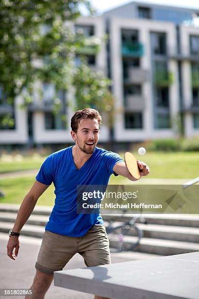 young man playing table tennis - mens singles table tennis stock-fotos und bilder