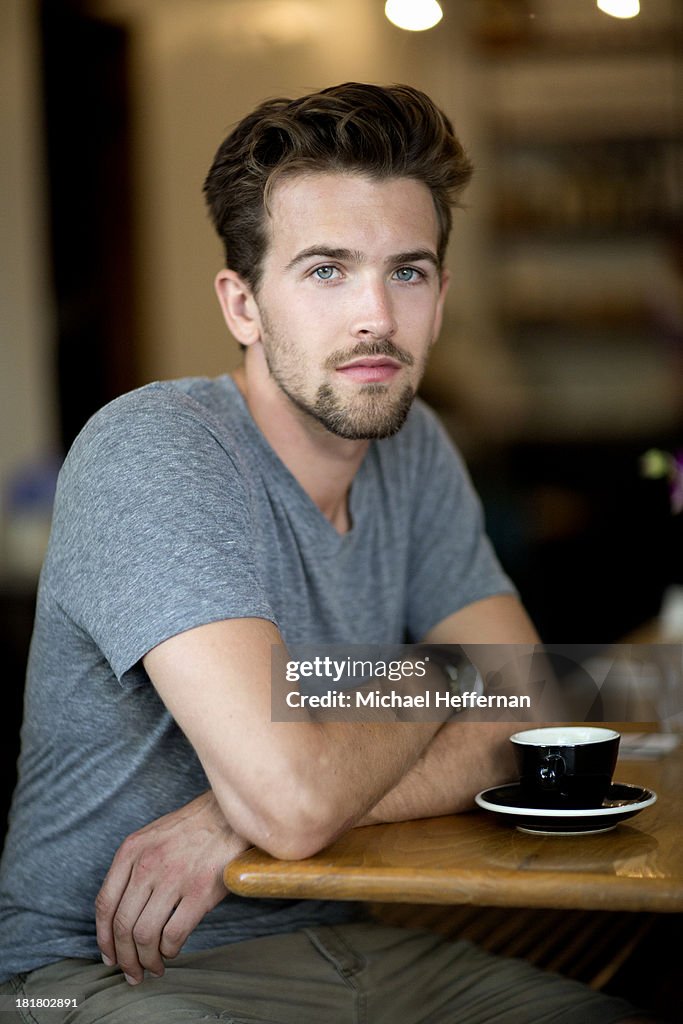 Portrait of young man in cafe