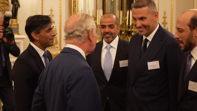 GBR: The King meets world business and finance figures at Buckingham Palace