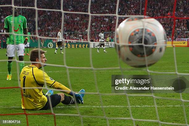 Ron-Robert Zieler, keeper of Hannover reacts after receiving the 4rd goal during the DFB Cup match between FC Bayern Muenchen and Hannover 96 at...