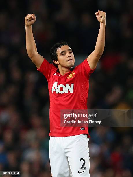 Rafael of Manchester United celebrates at the end of the Capital One Cup Third Round match betwen Manchester United and Liverpool at Old Trafford on...