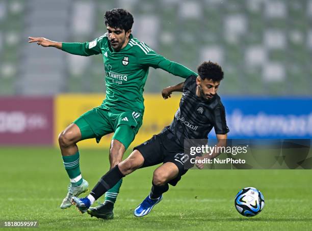 Yazan Abdallah Alnaimat of Al-Ahli SC and Khaled Ali Binsabaa of Al-Rayyan SC are battling for the ball during the EXPO Stars League 23/24 match...