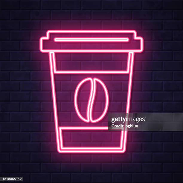 disposable cup of coffee. glowing neon icon on brick wall background - coffee take away cup simple stock illustrations