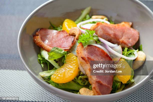 salad with pieces of meat and vegetables - cashew pieces stock pictures, royalty-free photos & images