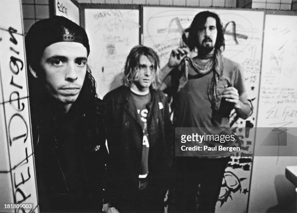 American rock group Nirvana, backstage in Frankfurt, Germany, 12th November 1991. Left to right: drummer Dave Grohl, singer and guitarist Kurt Cobain...