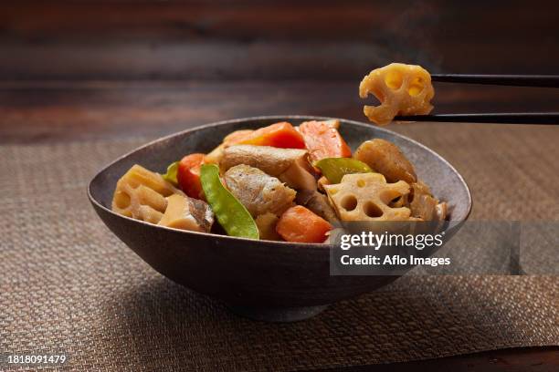 japanese style chikuzen ni chicken stew - chikuzenni stockfoto's en -beelden