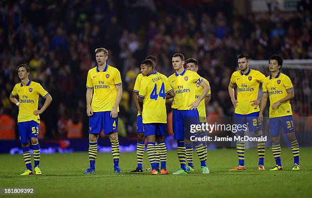 Serge Gnabry of Arsenal looks on after missing a penalty during the Capital One Cup third round match between West Bromwich Albion and Arsenal at The...