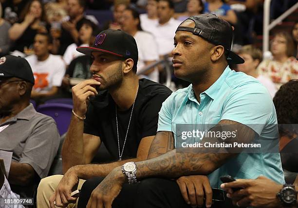 Kendall Marshall and P.J Tucker of the Phoenix Suns attend Game Two of the WNBA semifinal playoffs between the Phoenix Mercury and the Los Angeles...