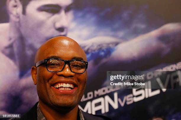 Mixed martial artist Anderson Silva of Brazil speaks to the media prior to a autograph signing at UFC Gym on September 25, 2013 in New York City.