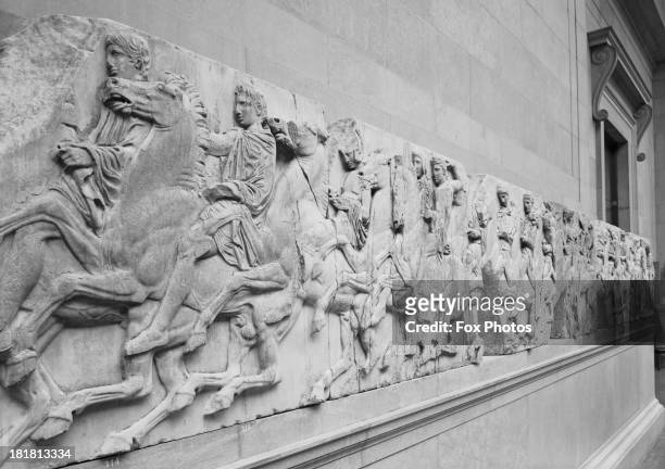 The Elgin Marbles, classical Greek sculptures also known as the Parthenon Marbles, on display in the Duveen Gallery at the British Museum, London,...