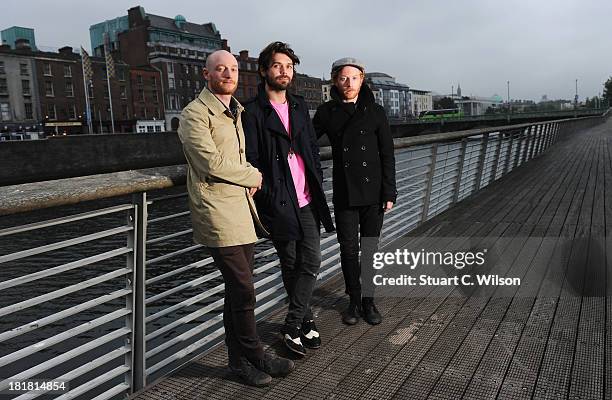 James Johnston, Simon Neil and Ben Johnston of Biffy Clyro pose ahead of tomorrow's fifth annual Arthur's Day celebrations on September 25, 2013 in...