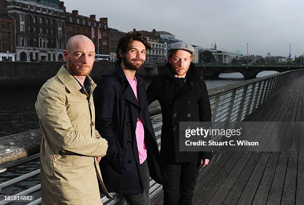 James Johnston, Simon Neil and Ben Johnston of Biffy Clyro pose ahead of tomorrow's fifth annual Arthur's Day celebrations on September 25, 2013 in...